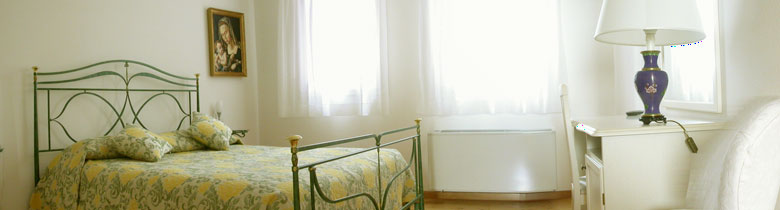 foto di una delle camere dell'agriturismo dotata di tutti i comfort